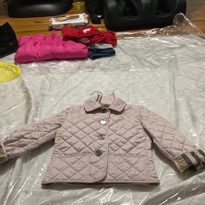 Button down pink jacket with plaid skirt